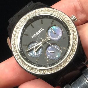 Fossil watch. Has SCRATCHES & needs BATTERY.